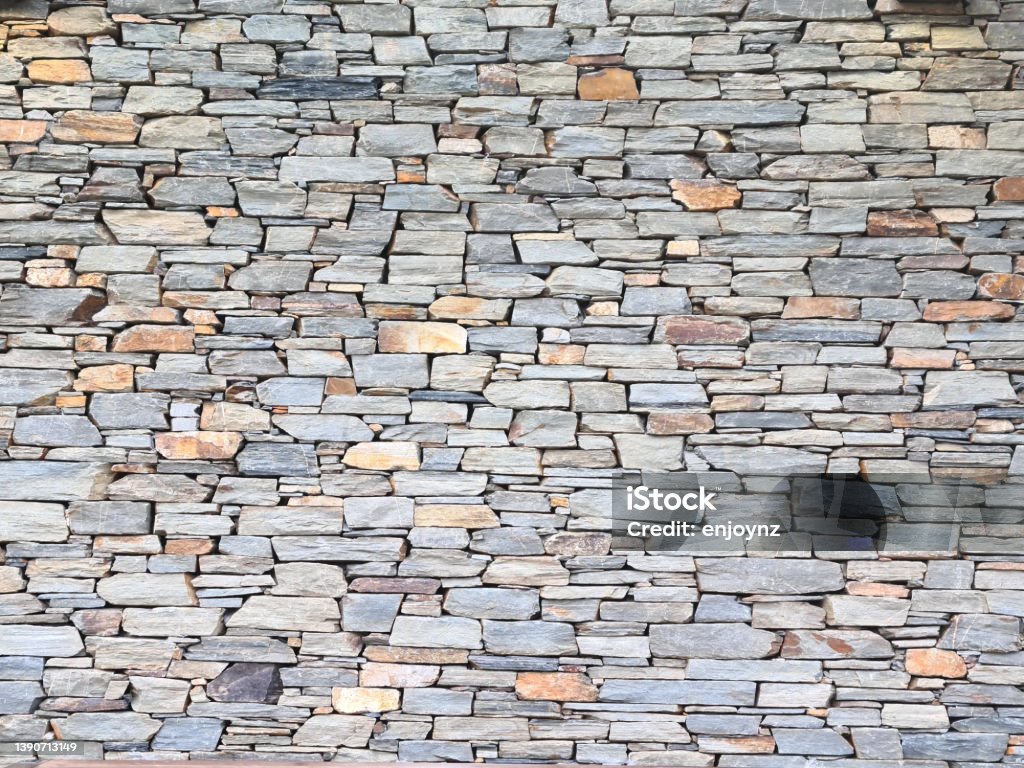 Stone wall background Schist stone wall in Central Otago, New Zealand Central Otago Stock Photo