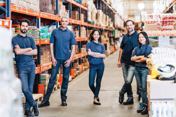 Portrait of multiracial people working in warehouse stock photo