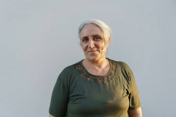istock Middle eastern senior woman portrait 1390720066