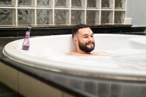 istock Man in the bathtub. 1390723363