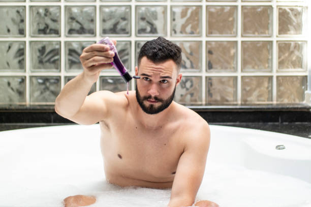istock Man in the bathtub. 1390723568