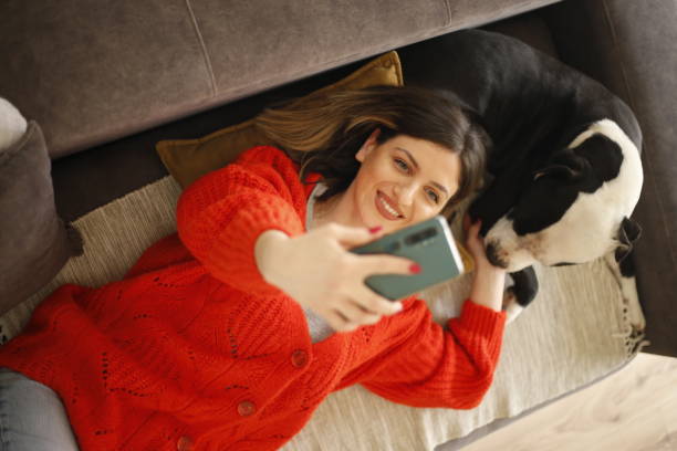 istock Women work at home pet sitter 1390723768