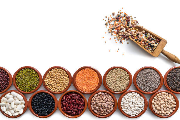 istock Dried legumes assorted in round containers isolated on white as lentils, chickpeas, soybeans and beans 1390724985