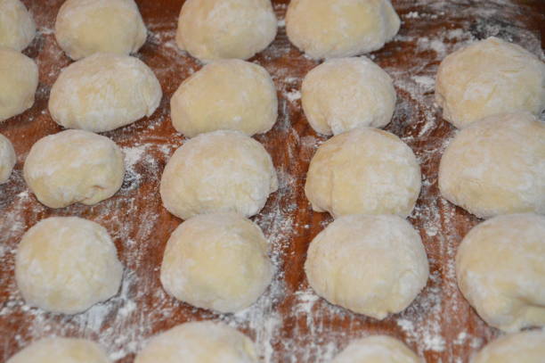 istock Cooking homemade whites with meat on yeast dough 1390725645