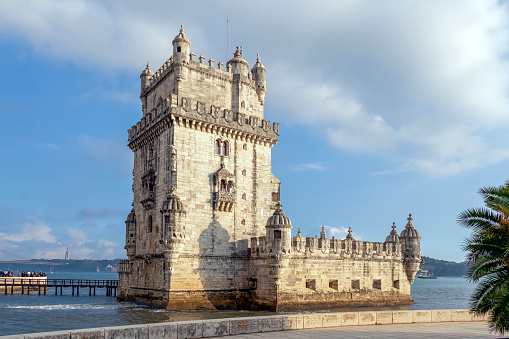Lisbon, Portugal - November, 2022 : Belem Tower, Portuguese historical monument on Tagus River in Lisbon during beautiful sunny day