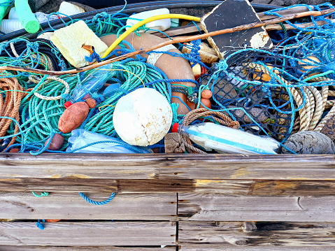 Traditional fishing tackle from the French West Indies. Tangle of old fishing ropes and polystyrene buoys. Ropes and buoys, Caribbean artisanal fishing tackle. Inshore sea fishing concept.