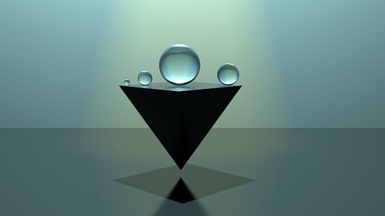 The Glass balls on the tip of a triangle. Glass balls balance. 3D render.