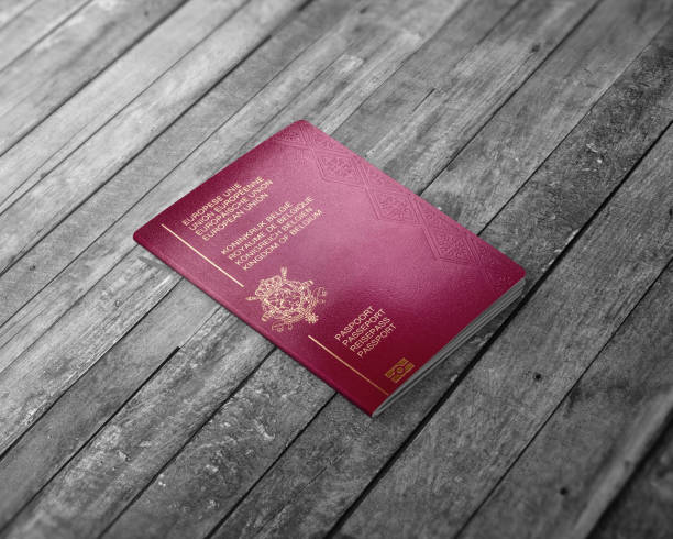 Belgium passport on a wooden board