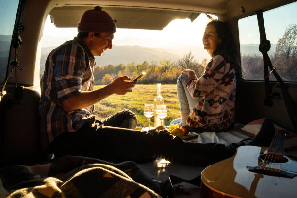 istock A young couple enjoying some quality time together in their camper van 1390738549