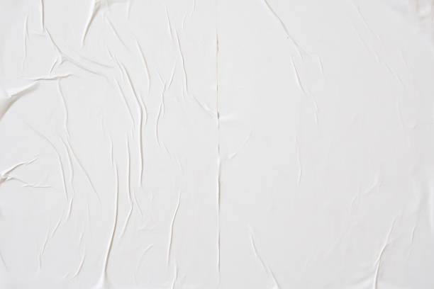 istock white crumpled and creased paper poster texture background 1390738744