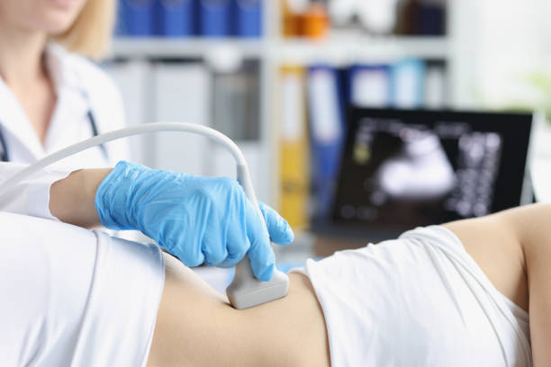 istock Professional medical worker examine clients body with ultrasound tool 1390738814
