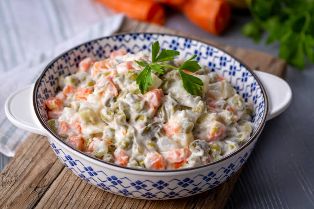 istock Russian salad Olivier with mayonnaise and egg served (Turkish name; Rus salatasi) 1390742436