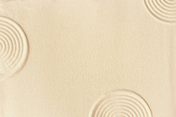 istock Pattern in Japanese Zen Garden with concentric circles on sand, concept for meditation, relaxation, tranquility. Aesthetic minimalist ornament sandy background. Beauty and spa backdrop 1390762383