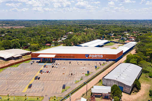 Coronel Oviedo, Paraguay - February 01, 2022: Aerial view of the newly opened Fortis market in Coronel Oviedo where Paraguayans can shop for cheap.