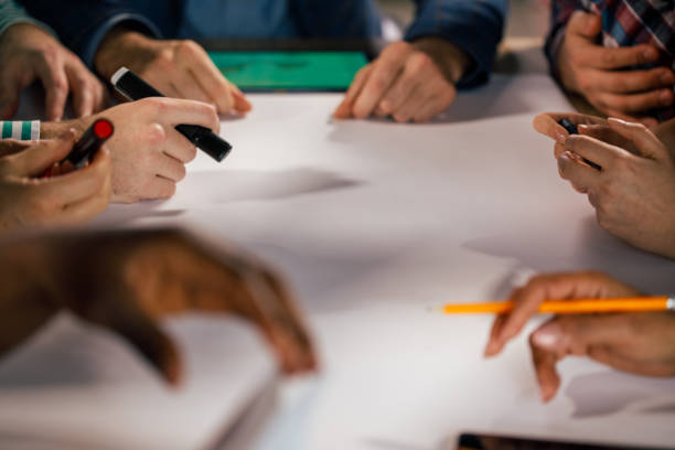 istock Unrecognizable team of entrepreneurs getting ready to write a start up plan 1390783336