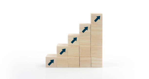 istock Wooden blocks chart steps with copy space. The business growth process 1390784470