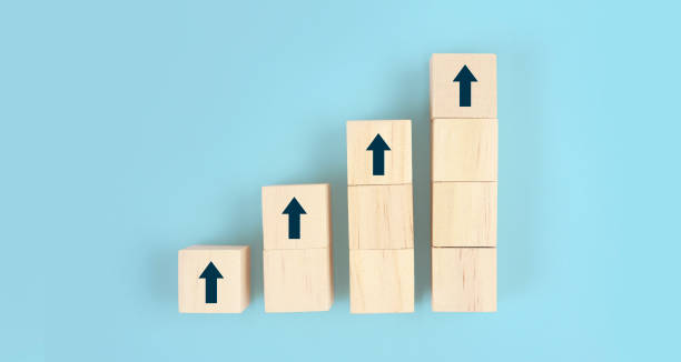 istock Wooden blocks chart steps with copy space. The business growth process 1390784471