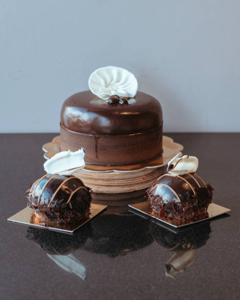 istock Three pieces of chocolate cake, Mini chocolate cakes, Chocolate Mousse Cakes 1390784533