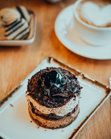 Black velvet bento cake, Chocolate small cake in restaurant background, Valentine's Day Cake, Asian food trend,  A cute gift for any holiday, Chocolate tartlet pastries on plate, Cafe dessert break, coffee and macaroon