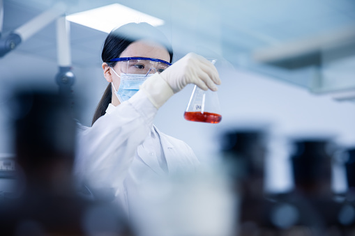 Female Scientist Working In Laboratory