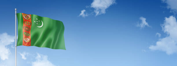 istock Turkmenistan flag isolated on a blue sky. Horizontal banner 1390792788
