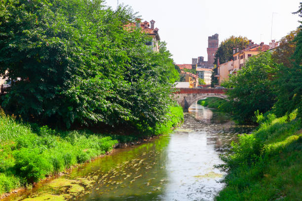Padua Italy water canal . Arched bridge in Italian town