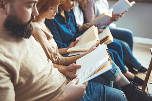 istock Diverse teen students studying together in university library 1390799102
