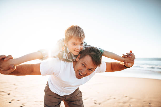 istock happy father embracing the son 1390800330