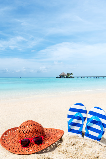 Enjoying summer beach holiday and sunbathing concept