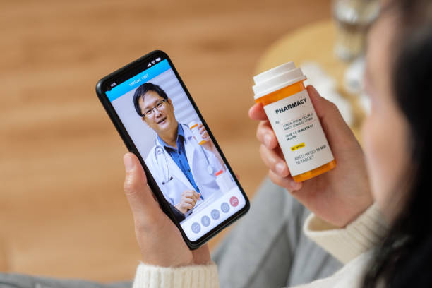 Consulting doctor visit on mobile app at home.telemedicine stock photo
