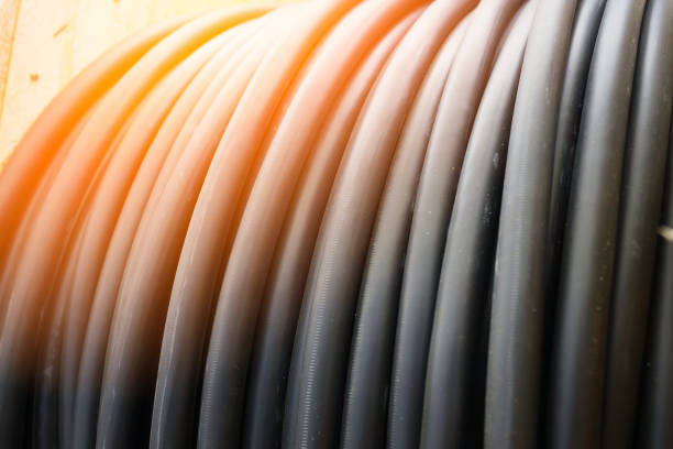 Production of copper wire, cable in reels at factory. Cable factory. Close up.