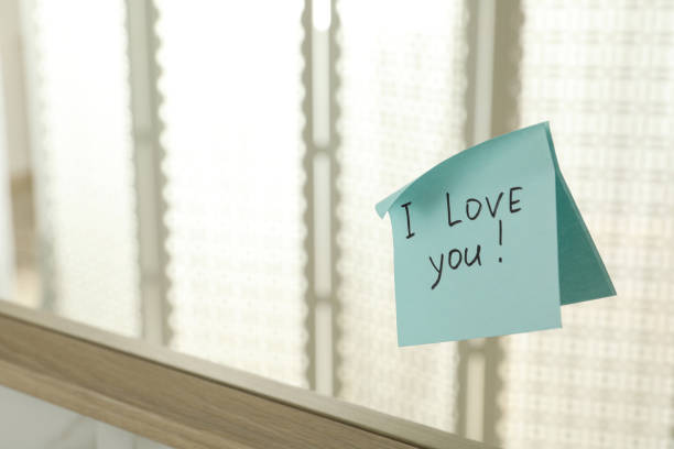 istock Sticky note with phrase I love you! on mirror, space for text 1390807742