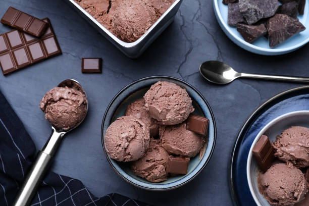 yummy chocolate ice cream served on black table, flat lay - yoghurt chocolate bowl bildbanksfoton och bilder