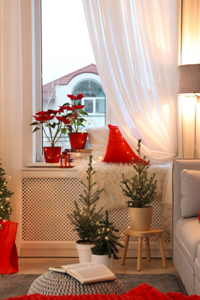 istock Living room with Christmas decorations. Festive interior design 1390809446