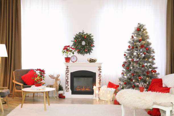 istock Beautiful living room interior with burning fireplace and Christmas tree 1390809511