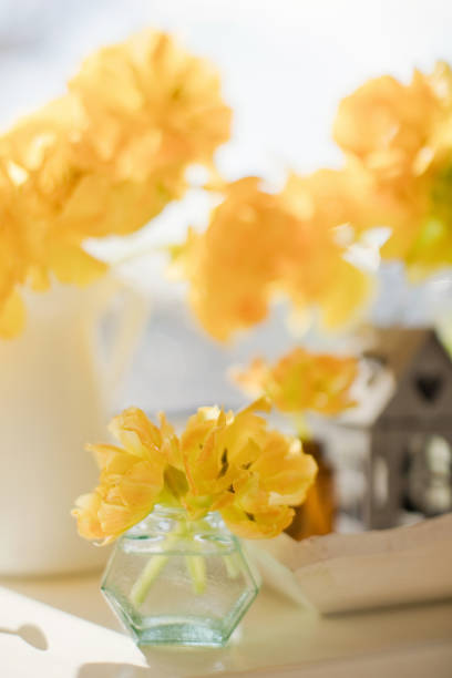 istock Yellow flower tulip in vase 1390810541