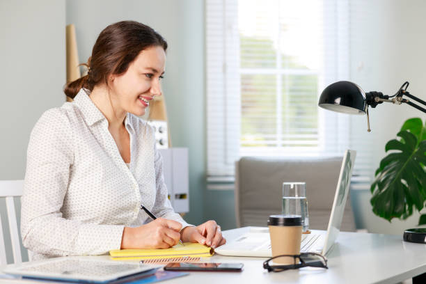 istock Young woman having video conference online 1390810658