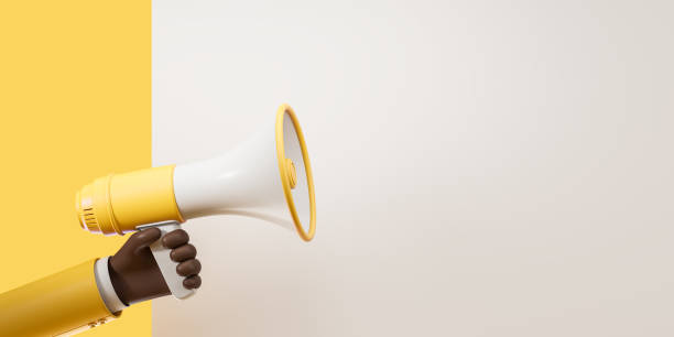 istock Black hand with megaphone on light background, advertisement. Mockup 1390810793