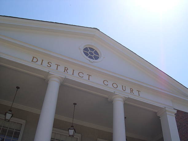 Gazing up at the pillars and roof of the district courthouse stock photo