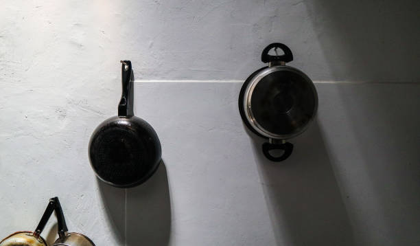 istock the pot that is hanging on the kitchen wall after use 1390814418