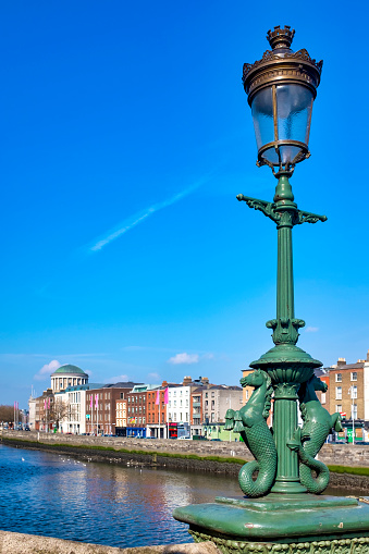 Ornate cast iron lamp standards on Grattan bridge featuring the mythical hippocampus, Dublin, Ireland,