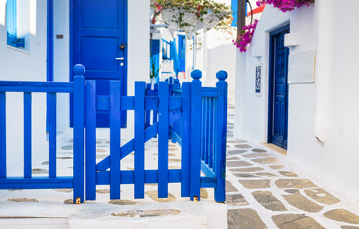 The island of Mykonos, Greece. Streets and traditional architecture. Entrance to a private home. Travel photography.