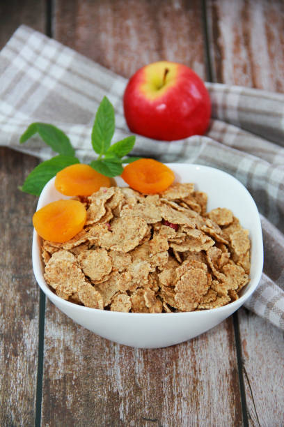 dry diet muesli, dried apricots and red a apple