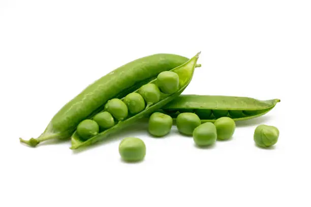 Photo of Fresh green pea isolated on white background with clipping path.