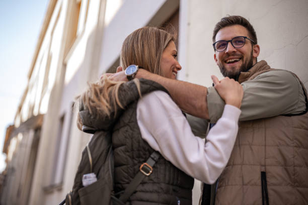 istock Young couple walking on city streets 1390823458