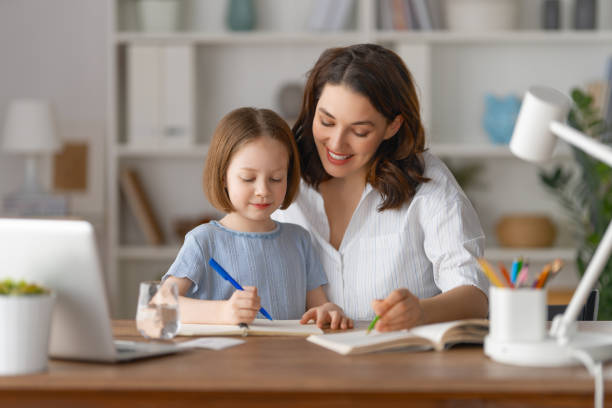 istock Girl doing homework or online education. 1390823642