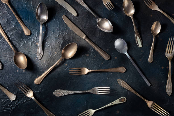 istock Cutlery. Various forks, knives, and spoons, elegant tableware 1390823760