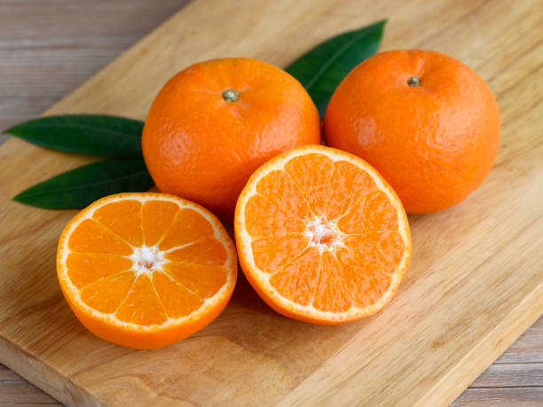 istock Sliced juicy orange pulp closeup 1390824447