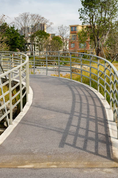 istock curved outdoor pathway in a park 1390825377