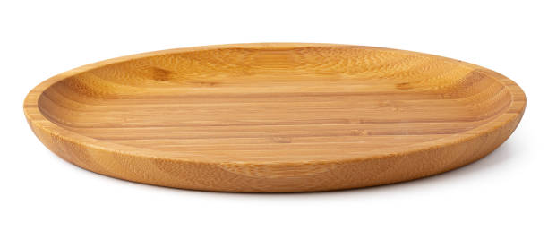 istock Wooden plate isolated on white background, close up 1390826391